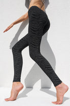 Black greenish zebra leggings medium high waist in cotton spandex shown from the side
