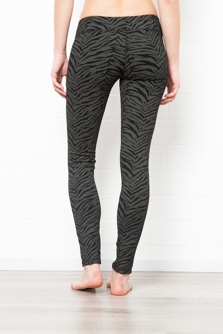 Black greenish zebra leggings medium high waist in cotton spandex shown from the back